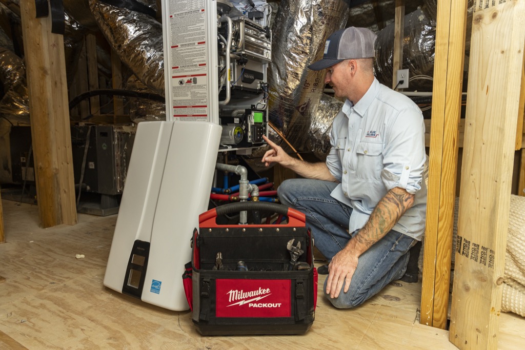 Blue Collars Plumber Fixing Water Heater