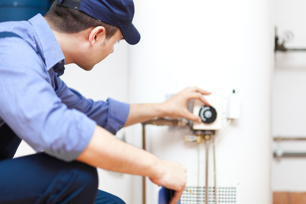 charleston Plumber repairing a hot water heater