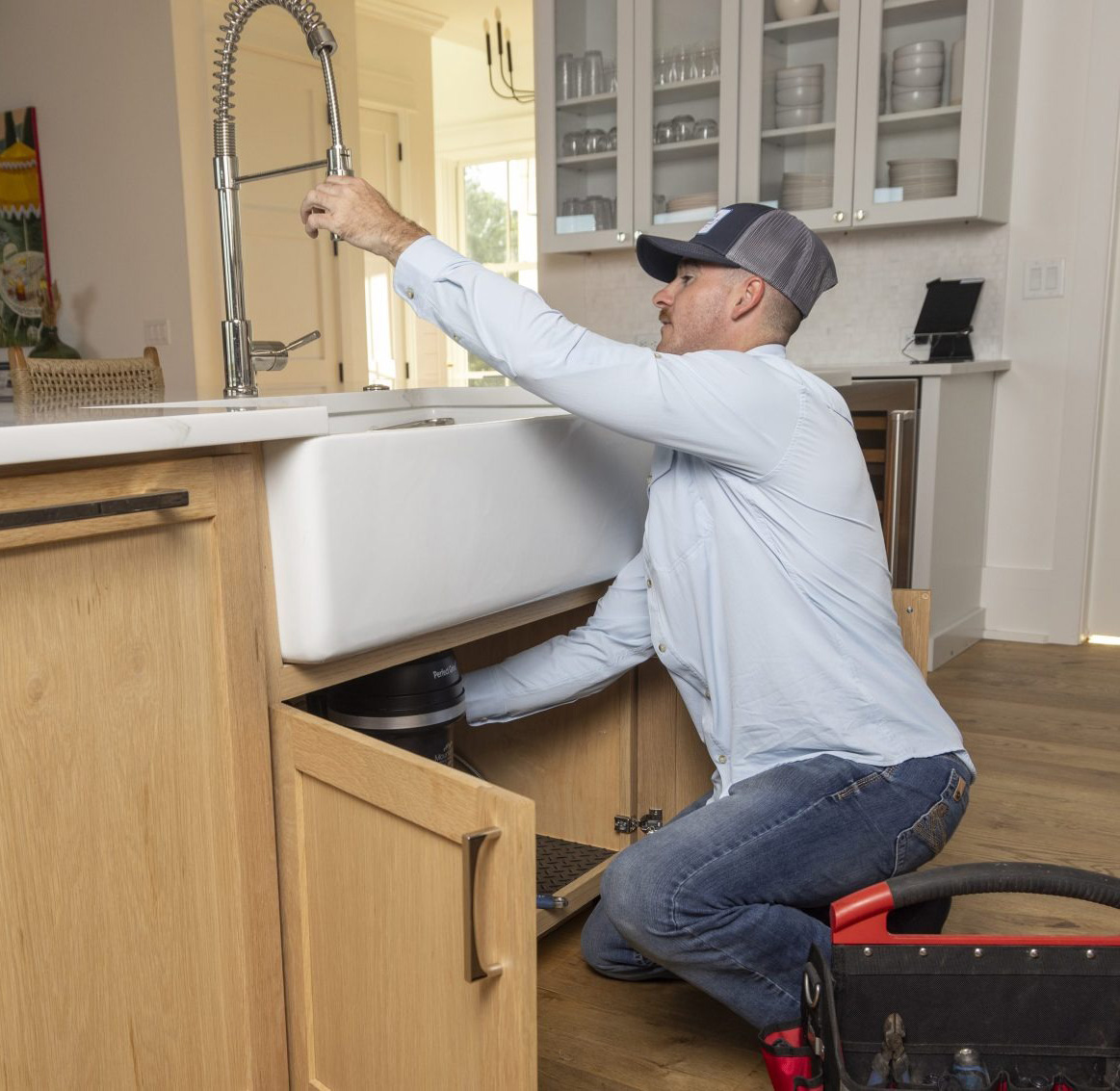 Blue Collars Working on Emergency Plumbing Issue in Charleston, Sc