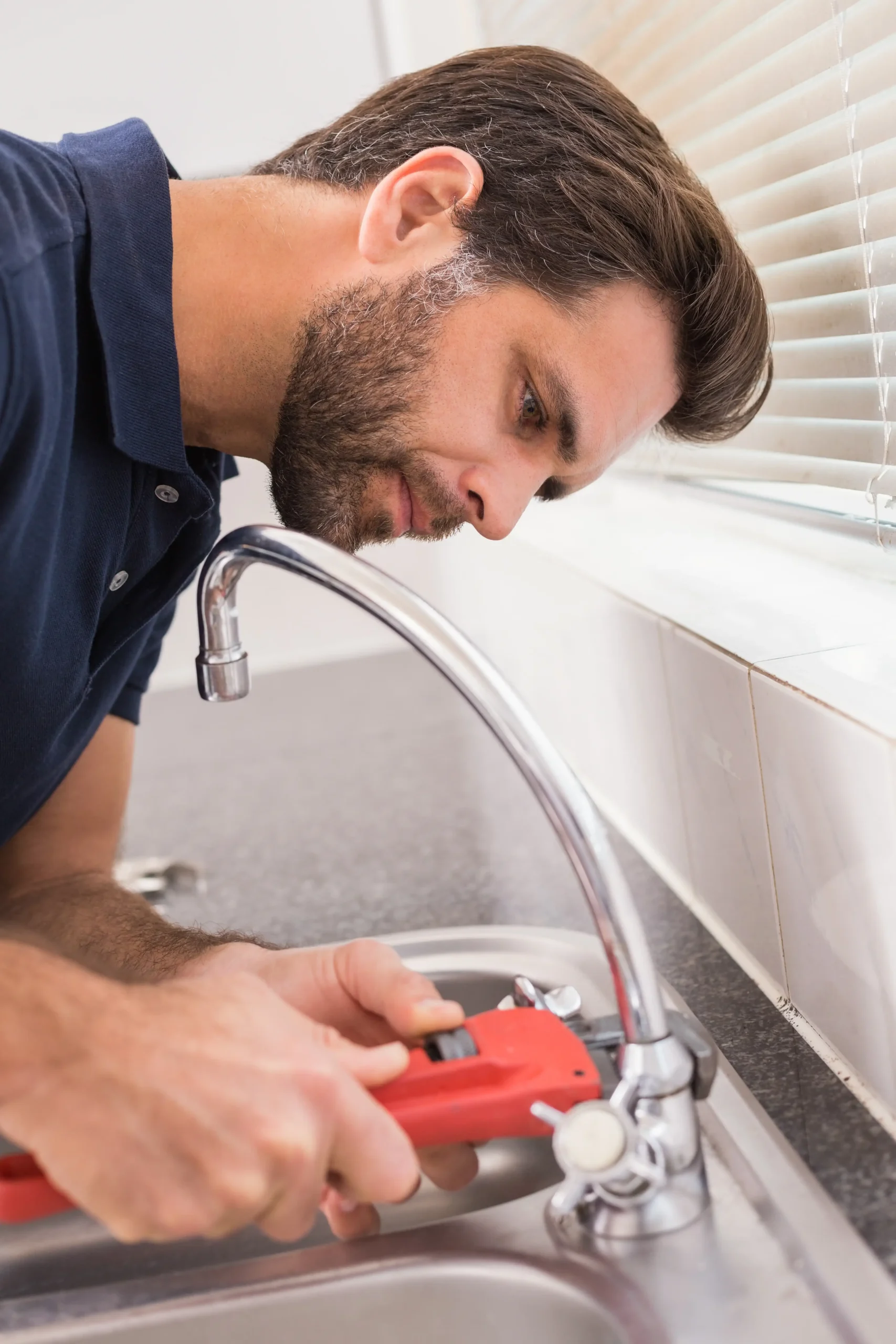 man-fixing-tap